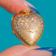 Edwardian engraved heart locket with 9ct Gold back and front