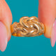 Victorian 9ct Gold Lover's Knot ring, front view of the intertwined design